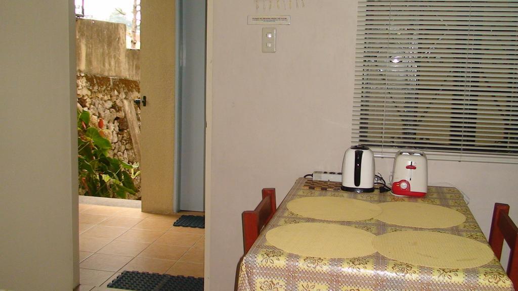 באגויו Lyn'S Do Drop Inn Transient House חדר תמונה